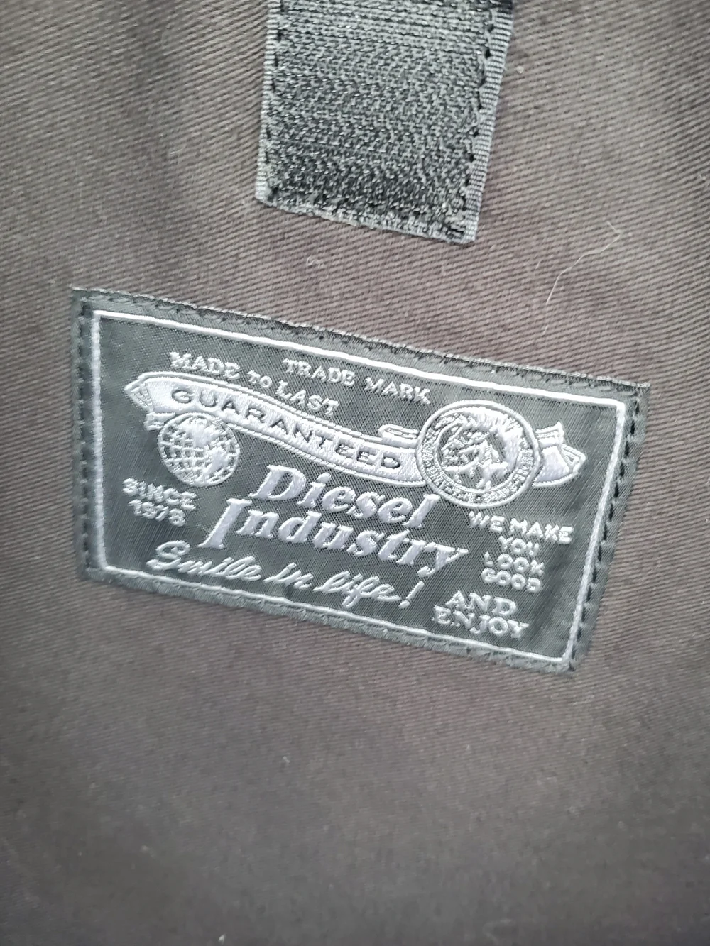 Diesel Industry Black Quilted Messenger laptop Bag with Red & Green Flag Accent